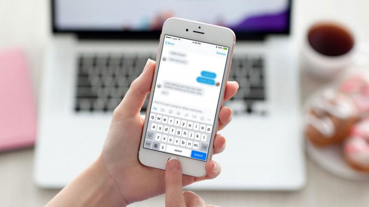 Person sending marketing messages from a phone